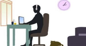 silhouette of person working at desk with cat on floor behind chair.